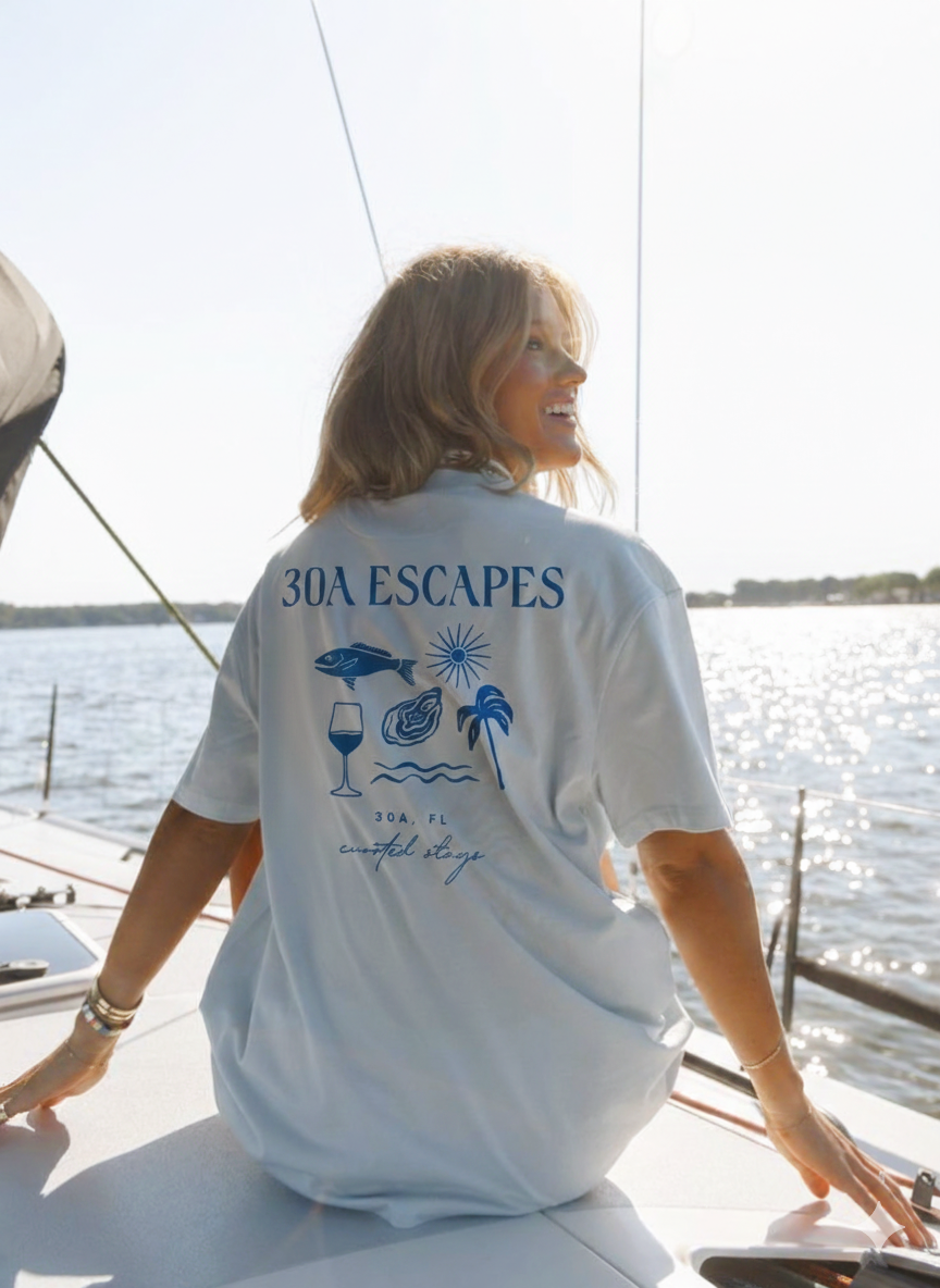 Woman on boat wearing 30a escapes t-shirt